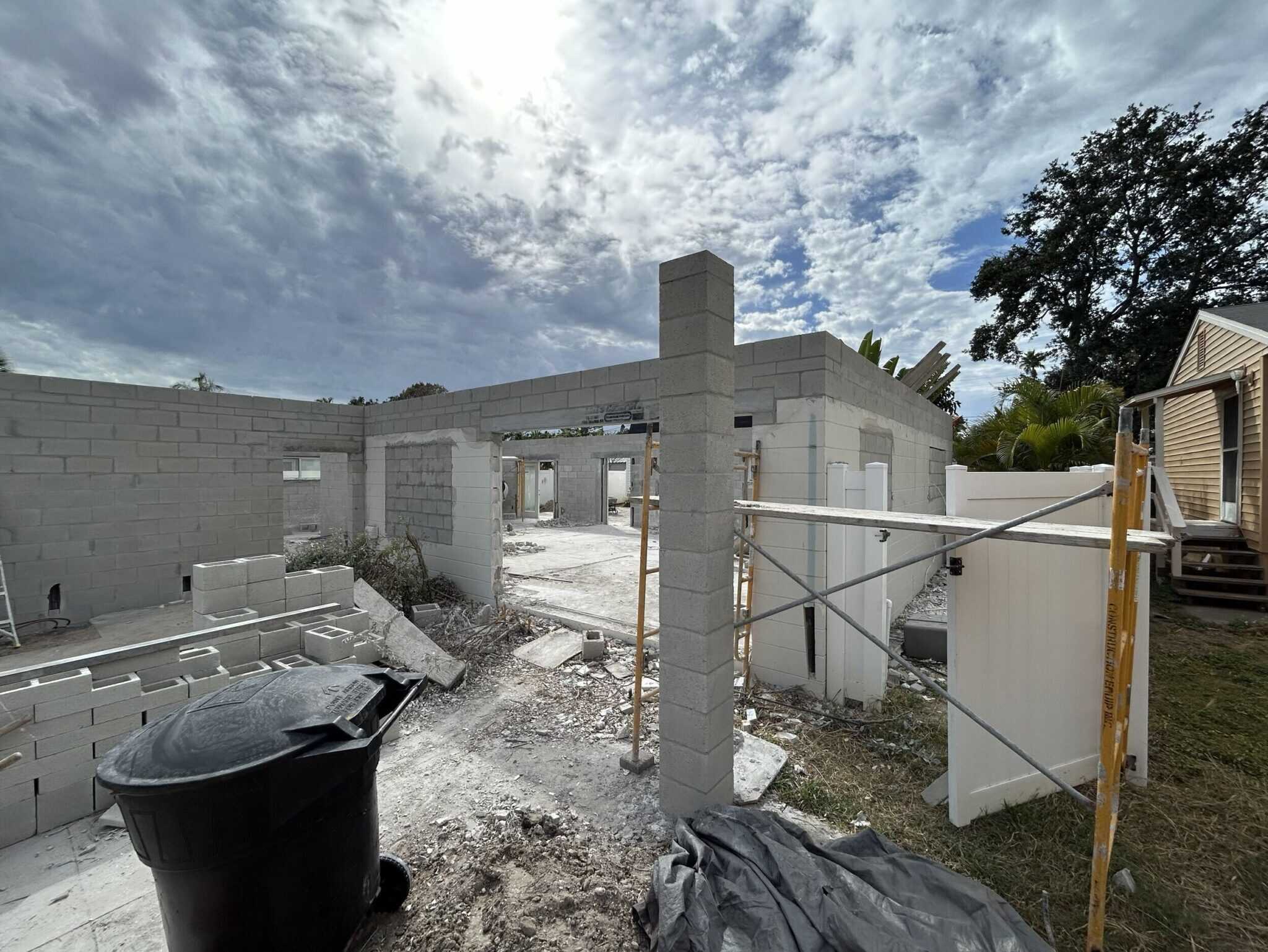 Concrete house construction site in progress showcasing state-of-the-art residential development by Iridium Development Inc., focusing on innovative building solutions and quality craftsmanship.
