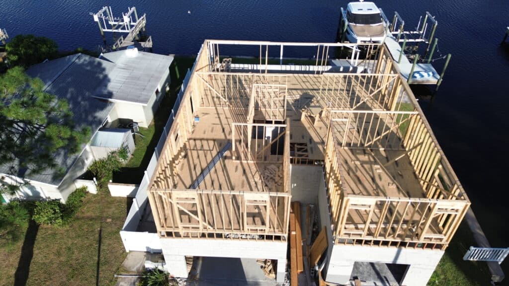 New residential building frame construction near water St Petersburg